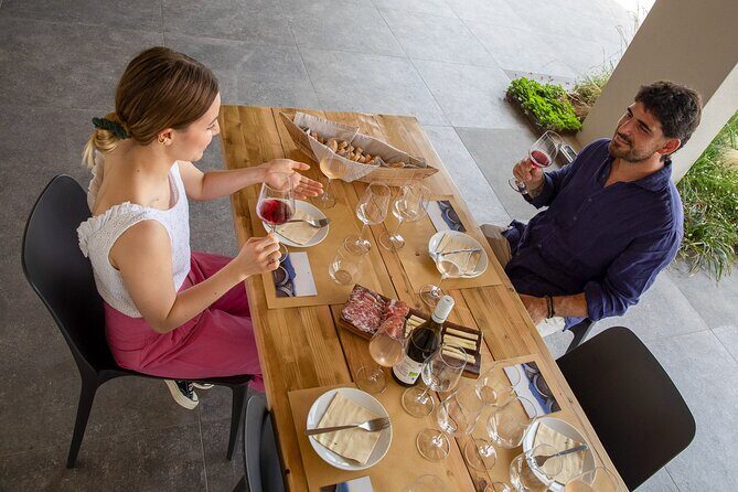 Bardolino Wine Experience - The tasting lineup: four wines plus Monte Veronese, Soppressa, and Coppa