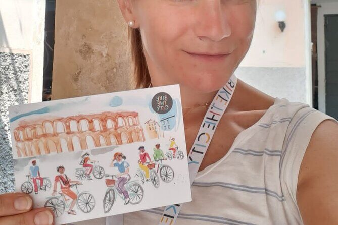 Highlights and hidden gems Verona Bike Tour - Porta Borsari and Piazza delle Erbe: Roman gate to market square