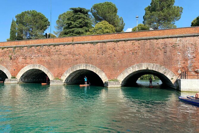 Sup experience with a ride to Peschiera del Garda Lake Garda - SUP on Lake Garda canals: why Peschiera feels different