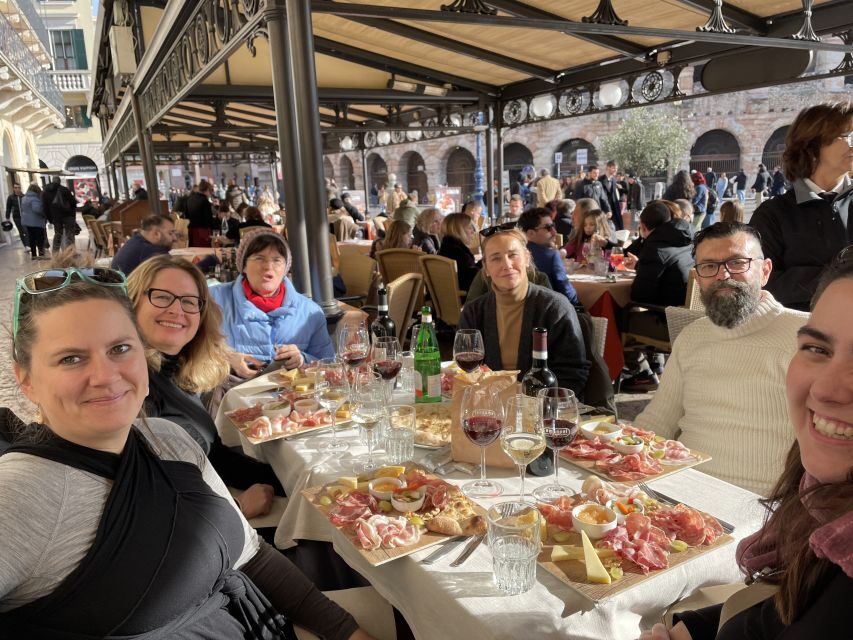 Verona: City Walking Tour with Cable Car & Wine Aperitif - The Medieval Center: Squares, Theater, and Scala Tombs