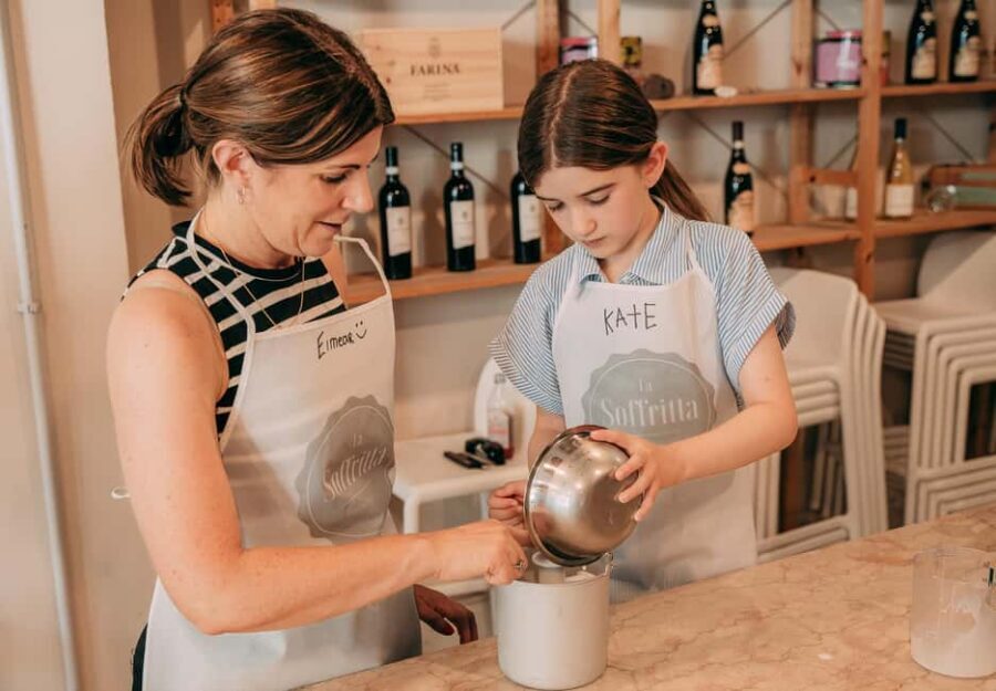 Verona: Gelato Making Class - How the class runs in the kitchen: apron on, fruit cut, machine mixed