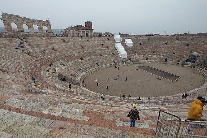 Verona Small Group Walking Tour with Cable Car and Arena Tickets - Piazza delle Erbe: market square lessons and optional tasting